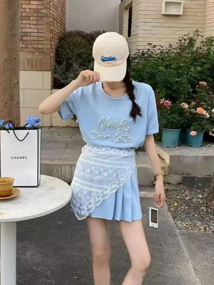 

2025 summer new light luxury Western style nail bead short sleeved T-shirt set French pleated skirt two-piece set