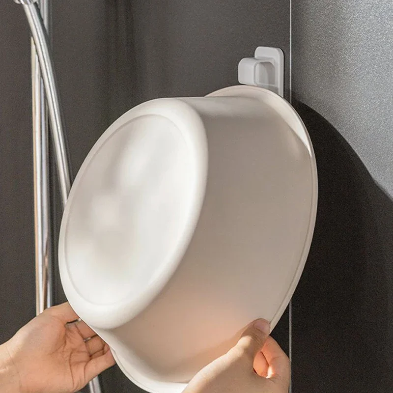 1 pz/2 pz lavabo gancio di stoccaggio Free-punch a parete lavabo palla da bagno gancio senza cuciture ventosa accessori per la conservazione del bagno