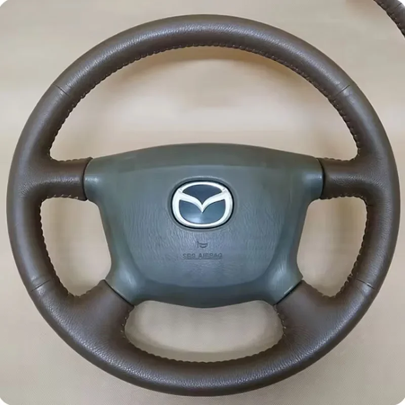 For Mazda Primus 323 Car accessories DIY Hand Stitched black nonslip wear-resisting Genuine Leather Car Steering Wheel Cover