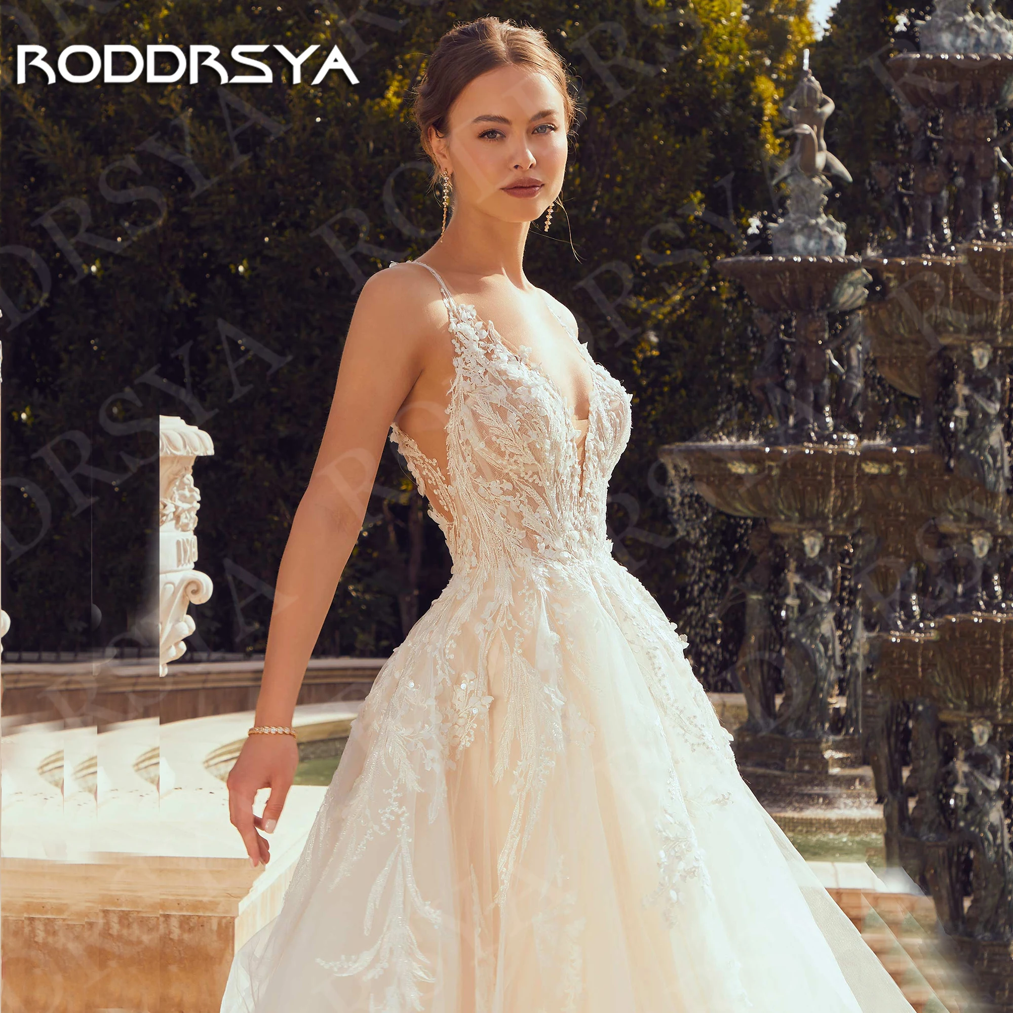 RODDRSYA Luxe Trouwjurk 2025 A Line robe de mariée Lace Illusion Back Tulle Bruidsjurk Mouwloze V-hals Aangepaste Vrouw Luxe Bruidsjurk 2025 A Lijn Kant Illusie Terug Tule Bruidsjurk Mouwloos V-hals Aangepaste Vrouw