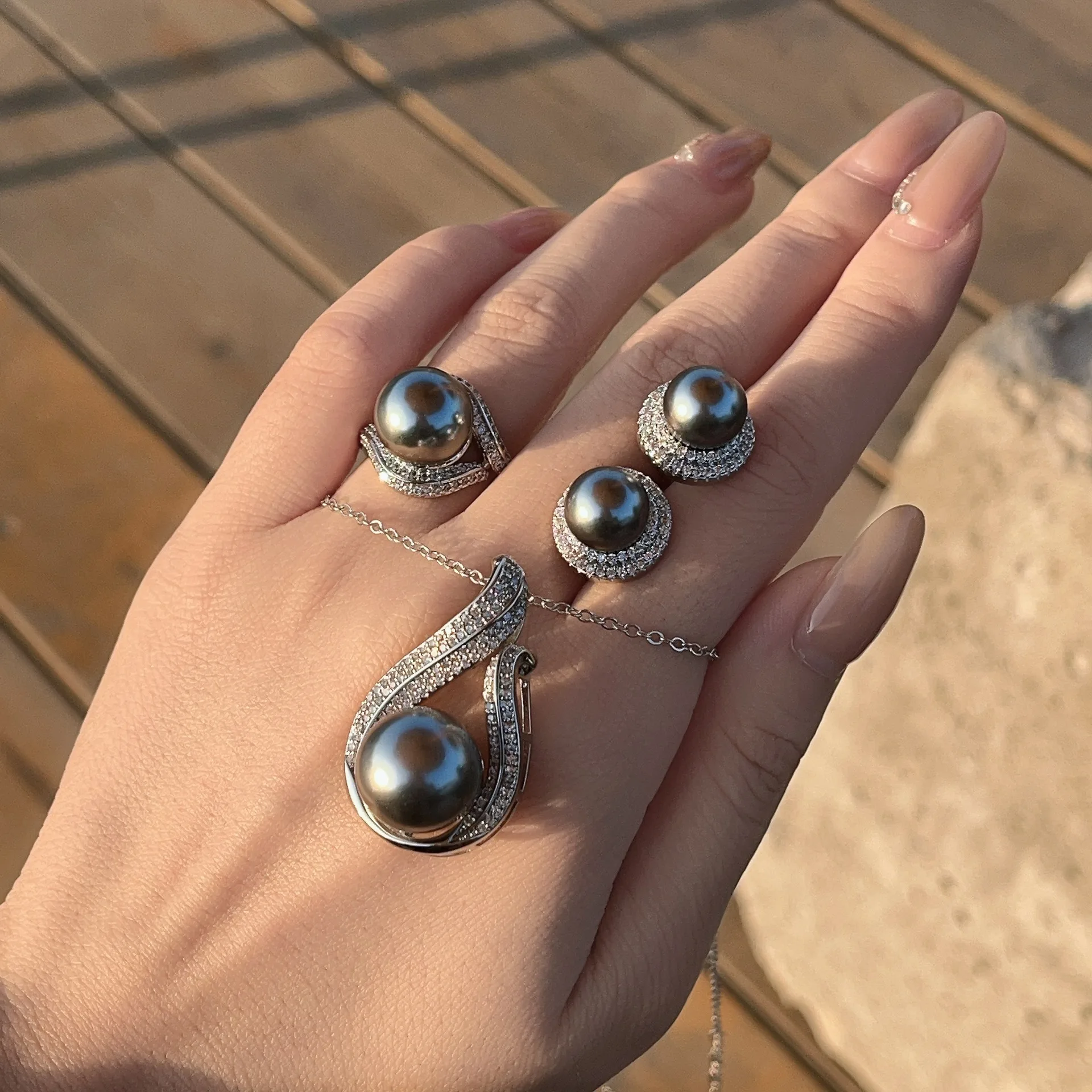 

2025 new pearl necklace for women light luxury simple high-end ring earring pendant three-piece set