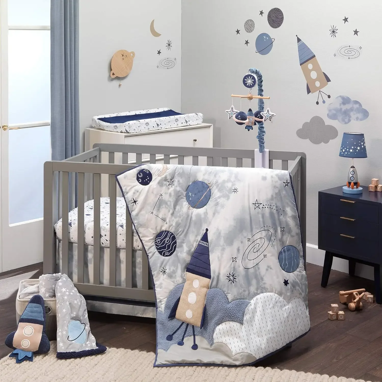 

Lambs & Ivy Sky Rocket 5-Piece Blue Galaxy/Space Nursery Baby Crib Bedding Set