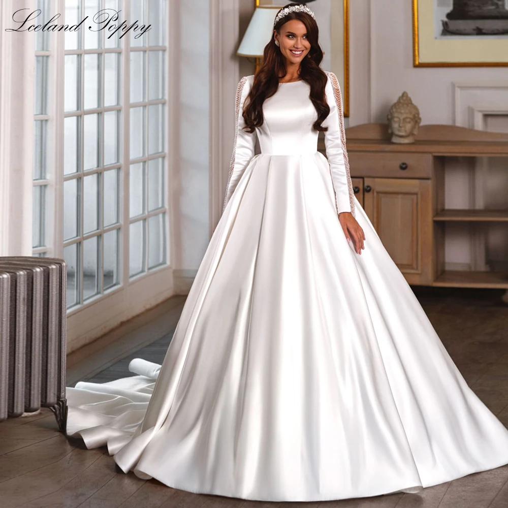 

Lceland Poppy Elegant A Line Scoop Neck Satin Wedding Dresses Long Sleeves Beaded Backless Bridal Gowns with Court Train