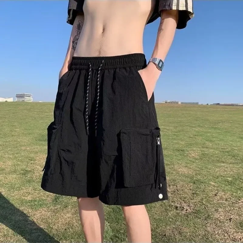 

С карманами, однотонные короткие брюки для мужчин, свободные мешковатые шорты-карго с эластичной резинкой на талии, широкие мужские шорты-карго, уличная одежда, повседневная эластичная одежда Y2k