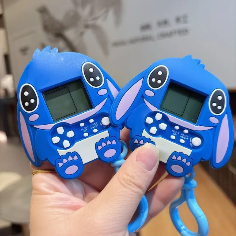 漫画スティッチゲーム機キーホルダー減圧テトリスゲームバッグペンダントカップルギフト