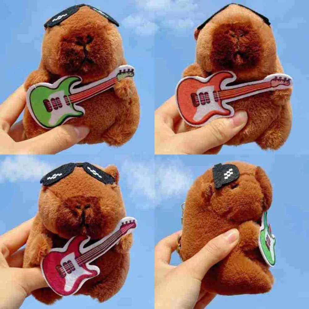 Peluche bambola chitarra capibara ciondolo peluche portachiavi creativo peluche capibara portachiavi carino divertente rock capibara bambola di peluche