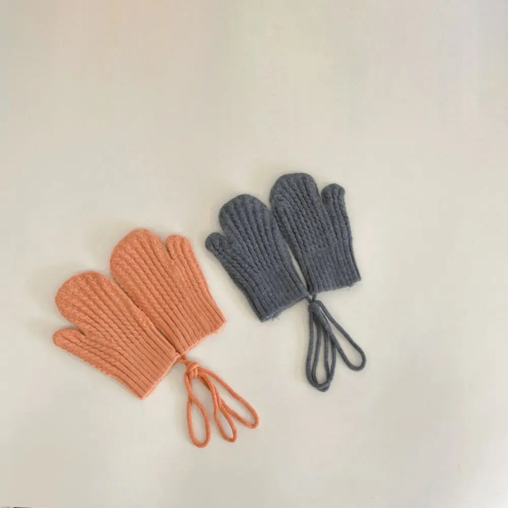 Nuevos guantes de punto de otoño e invierno, manoplas de Color sólido a prueba de frío para niños, guantes cálidos informales con cordones para niños