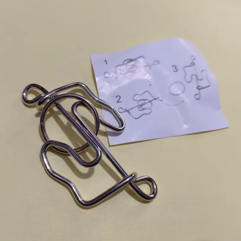 Metal Wire Puzzle Solution Brain Teaser Magic Rings Puzzles Game Toy