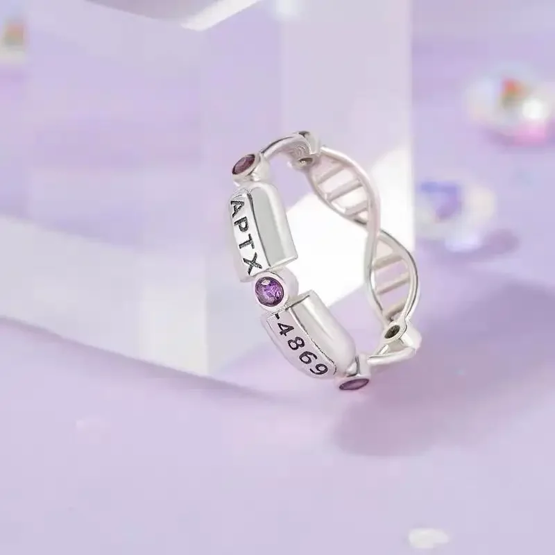 Detective Conan mismo estilo 4869 cápsula APTX tema nicho lindo anillo simple accesorios de anime regalos de vacaciones para hombres y mujeres