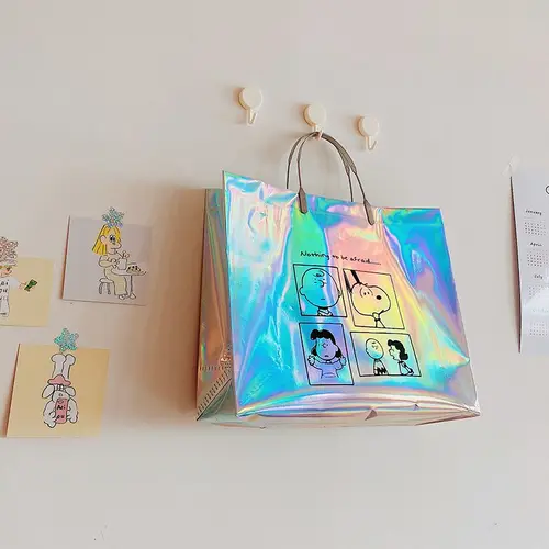 Imagen 2 del producto Bolsa de papel Snoopy para mujer, bolso de mano láser creativo, impermeable, embalaje de regalo de dibujos animados, ecológico, gran capacidad