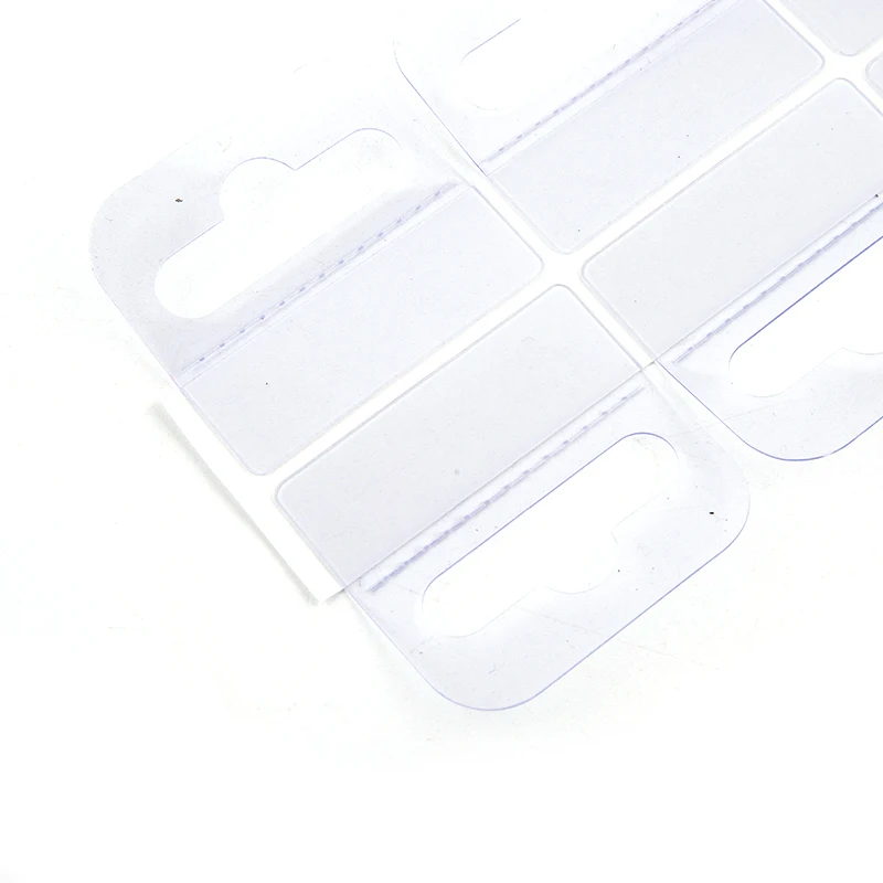 100pcs PVC Slot Hole Adhesive Hang Tabs Tag Merchandise Box Bag Peghooks Display