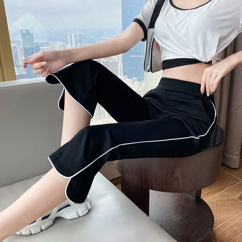 Koreanische Mode Sommer dünne Capris Frauen solide elastische Taillen taschen Patchwork Split hohe Taille lässig Flare waden lange Hosen