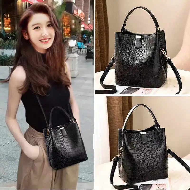 

2024 New Retro Crocodile Fashion Trend One-shoulder Oblique Span Women's Simple Everything Magnetic Fold Buckle Bucket Handbag