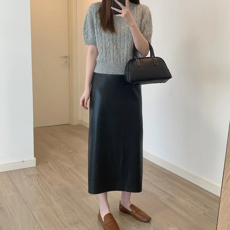 2025 women's simple style high waist half-body leather skirt, rear split fork, medium and long PU leather skirt