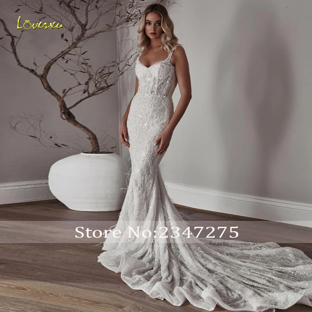 Loverxu حورية البحر فساتين زفاف مثيرة على شكل قلب بدون أكمام فيستدو دي نوفيا دانتيل مطرز لامع مصنوع حسب الطلب فستان زفاف