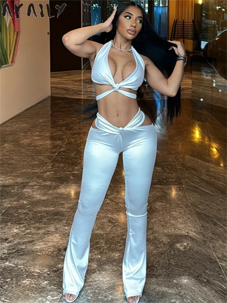 Akaily Summer White Sexy Hollow Out 2 Piece Set Night Club Outfits For Women 2024 Halter Backless Crop Tops Pants Matching Set