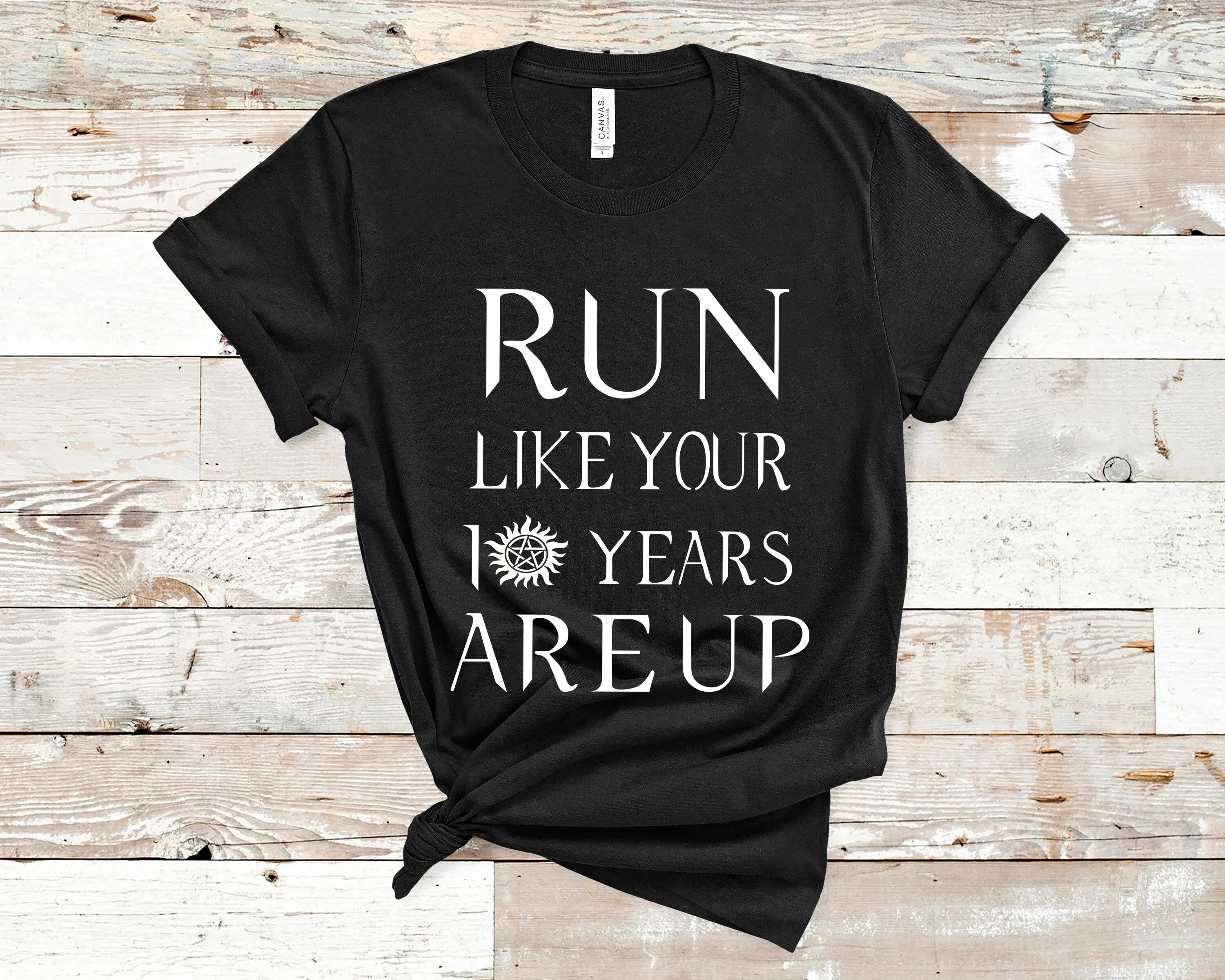 Supernatural T Shirt Run like your 10 year are up Crowley Carry on my Wayward Son Thanks for the memories Sam Dean Castiel