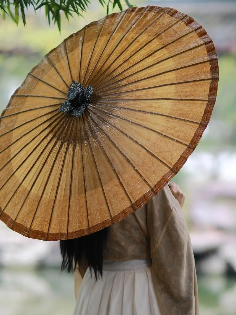 

Chinese-style Oil Paper Umbrella with Ancient Hanfu Style