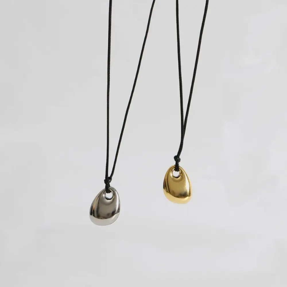 Collar de cuerda negra de aleación de moda, colgante de frijol, cadena larga ajustable para suéter, joyería de moda dorada/plateada, cadenas para clavícula