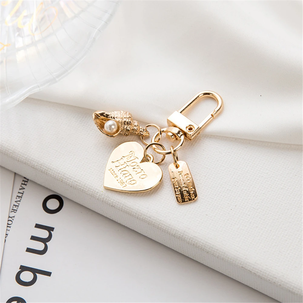Creative Alloy Shell Pearl Key Chain for Women Cute Conch Pendant Keyring Handbag Ornament Car Key Accessories Small Gifts view 6