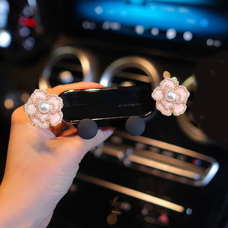Neuer Schwerkraft-Auto-Handyhalter, stark und langlebig, luxuriös, niedliche Perlenblume, universeller Auto-Lüftungsclip für iPhone, Xiaomi, Samsung