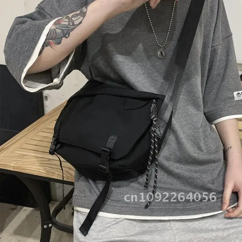 

Crossbody men's ins Japanese postman cross-bag students Korean bag shoulder tooling Joker small bag leisure