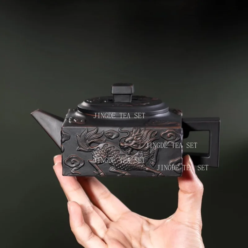 200ml Yunnan Purple Pottery Teapot Home Handmade Carving Qilin Four Sided Rotating Phoenix Singing Pot Large Capacity Teapot