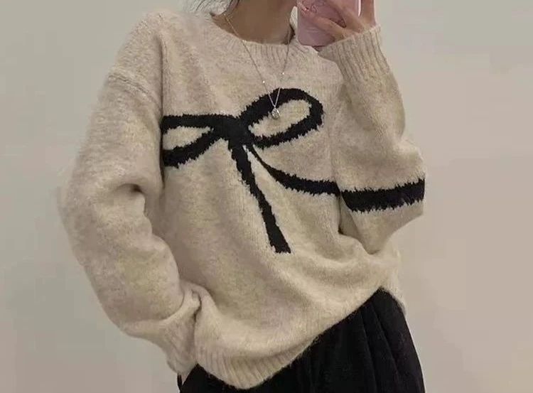 2025 ربيع جديد طويل الأكمام محبوك قميص المرأة فضفاضة القوس الكتف مقنعين سترة أعلى