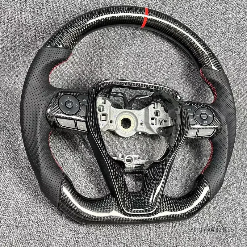 

Руль спортивный из настоящего карбона и кожи для Toyota Camry 8-го поколения, Rav4 HYBRID, Corolla E210 Hatchback 2018+
