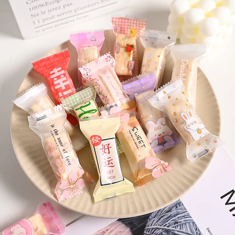 100Pcs 4x9cm Cute Cartoon Animal Printed Plastic Baking Packaging Nougat Toffee Candy Food Machine Sealed Gift Bags