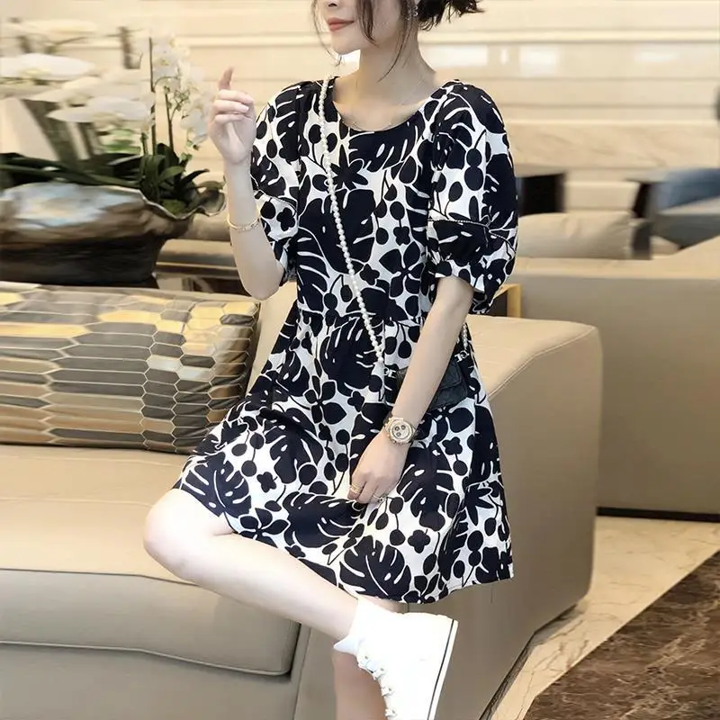 เสื้อผ้าสตรีแฟชั่น Vintage พิมพ์ชุด Midi ฤดูร้อนพัฟแขนตัด Casual Spliced รอบคอ A-Line Dresses