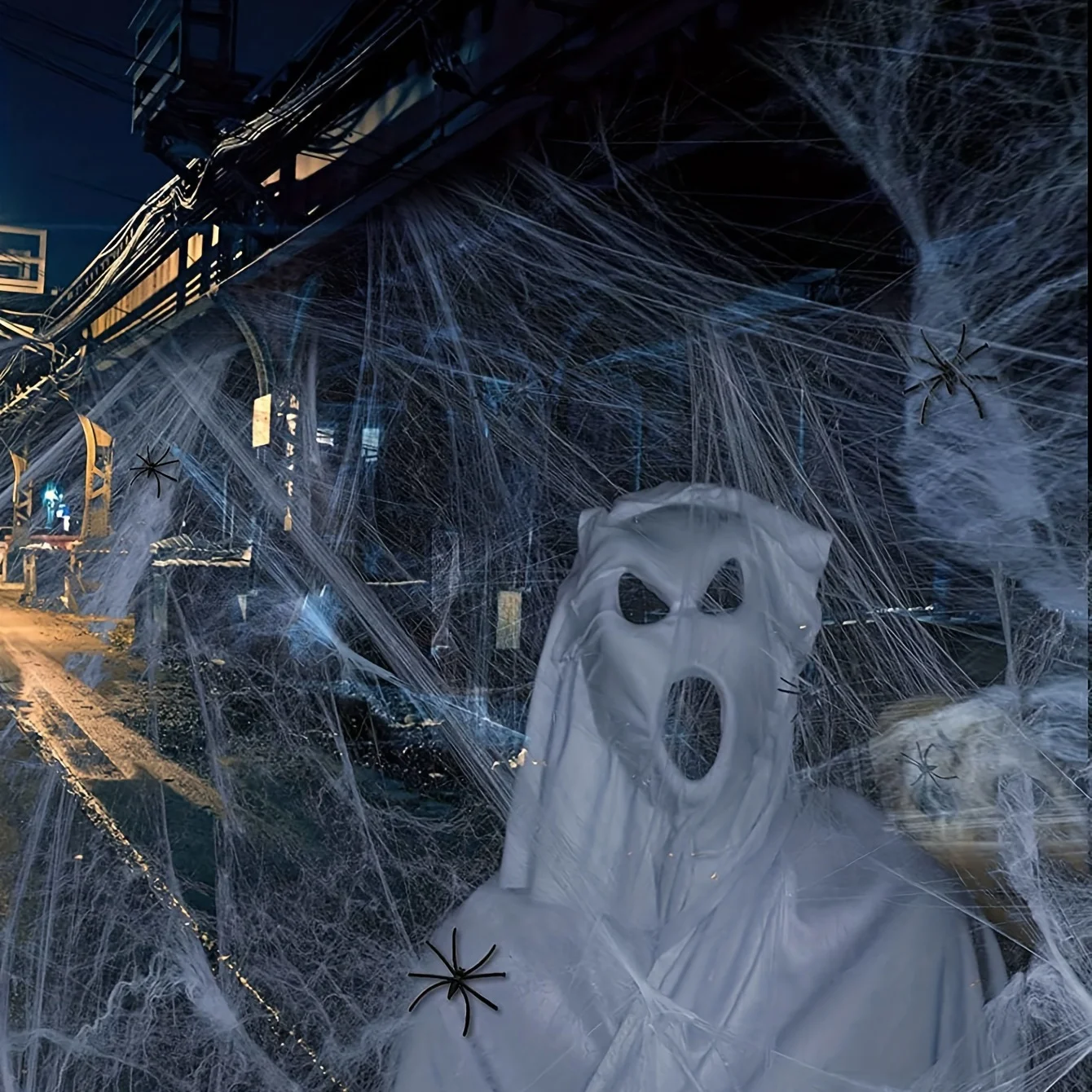 40g Spinnennetz 4 Spinnen-Halloween Spinne dehnbares Dekor für Outdoor-Halloween-Spaß und Spukhaus-Transformationen