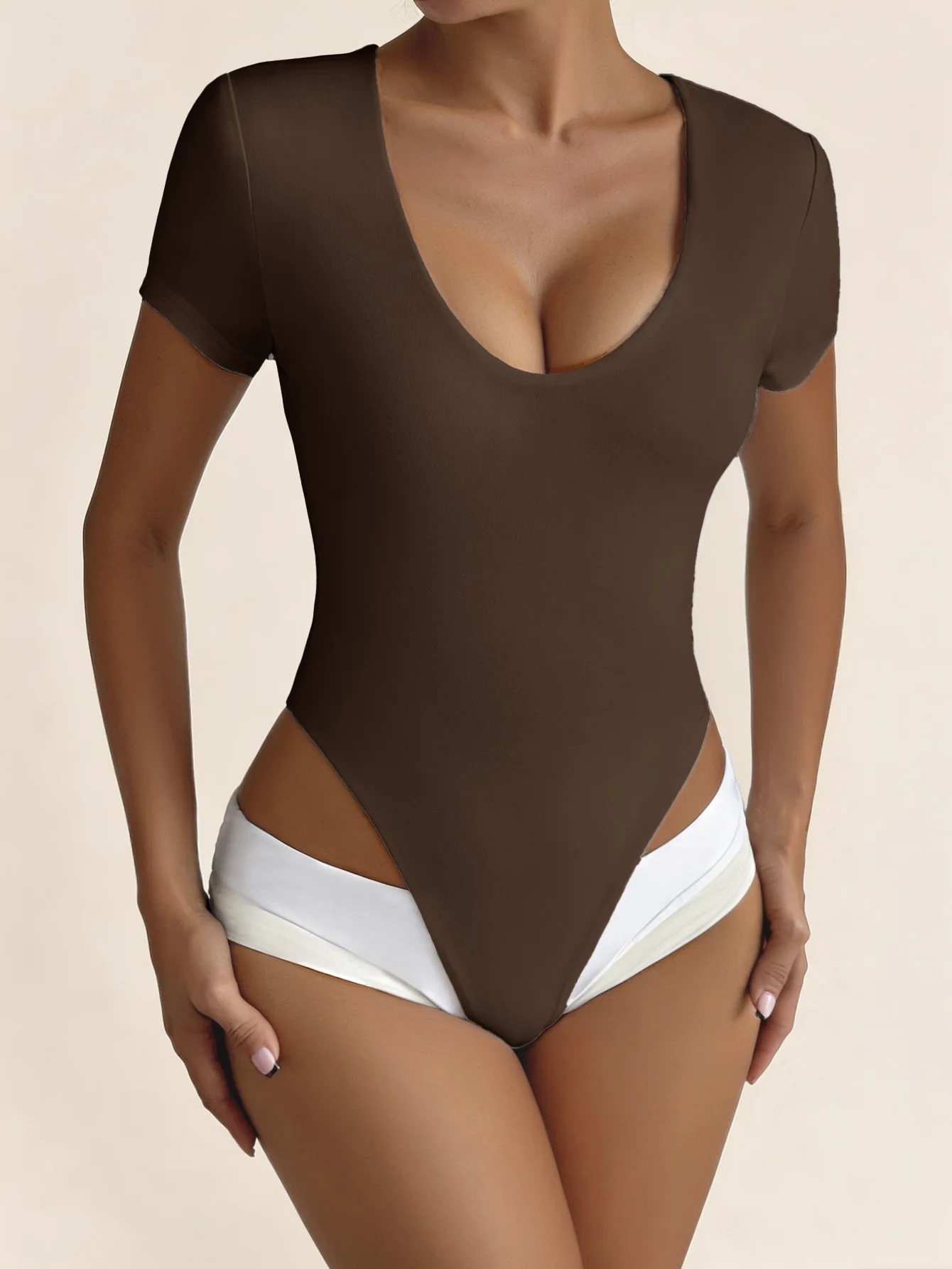 

Women's Jumpsuit Summer New Fashionable and Sexy Yoga Sports Style Solid Color Low Cut Round Neck Tight Short Sleeved Jumpsuit