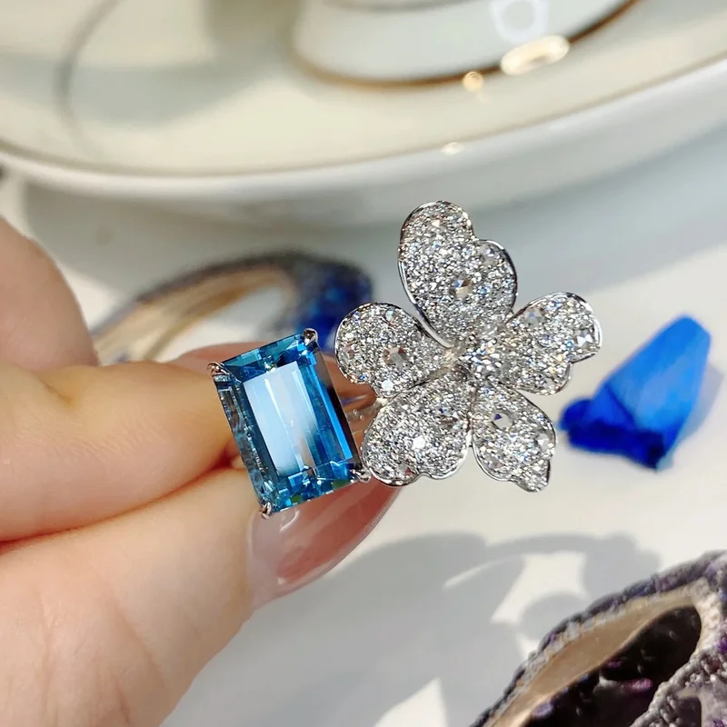 Pure silver French colored sapphire open ring, women's five petal ring, light luxury, high-end feeling, niche simplicity