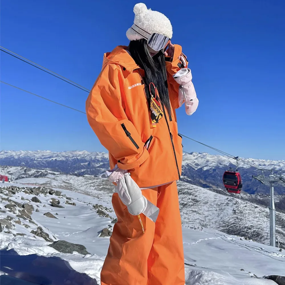 بدلة تزلج نسائية من NuJune X Zachariah سترة شتوية حرارية مقاومة للماء مع بنطلون للتزلج على الجليد معطف فضفاض عصري على الجليد #5