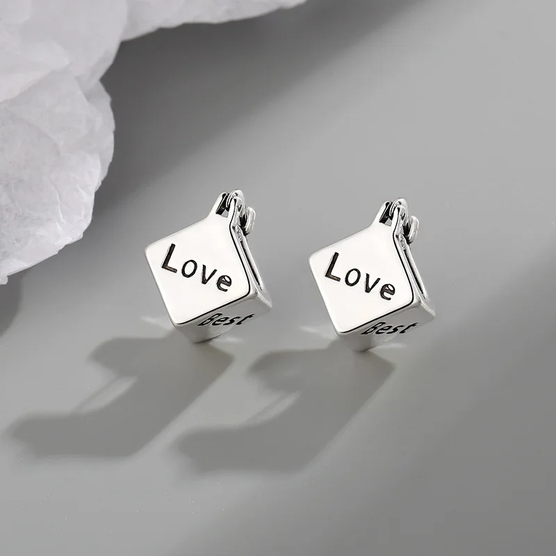 2025 Vintage high-end letter cube block Luck ear buckle with simple and niche design, light luxury earrings