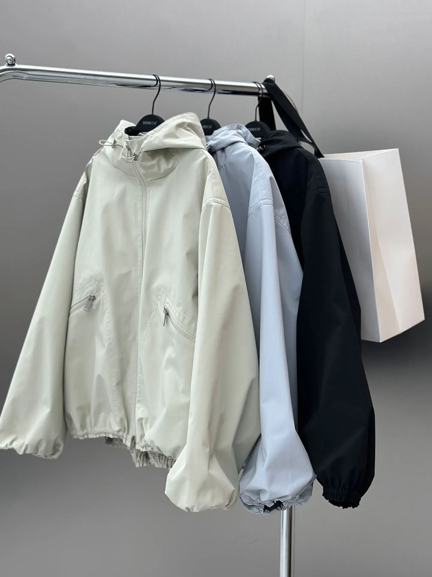 

BodhlCat Spring 2026 Women's Casual Outdoor Workwear Windbreaker Hooded Jacket Drawstring Versatile Polyester Coat
