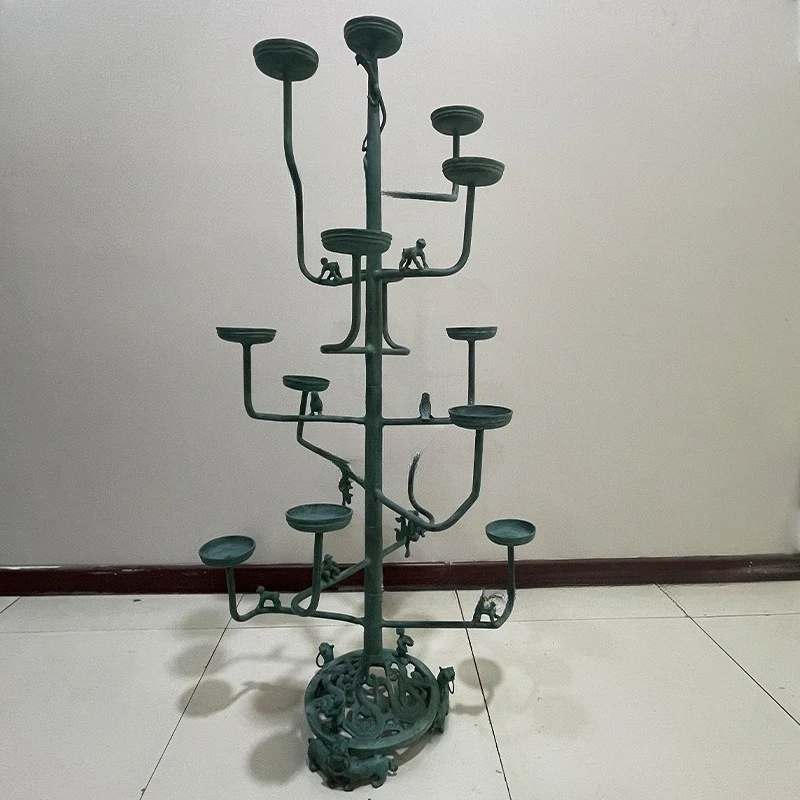 Reproduction of antique bronze candle holders with continuous lamps, wedding and film props