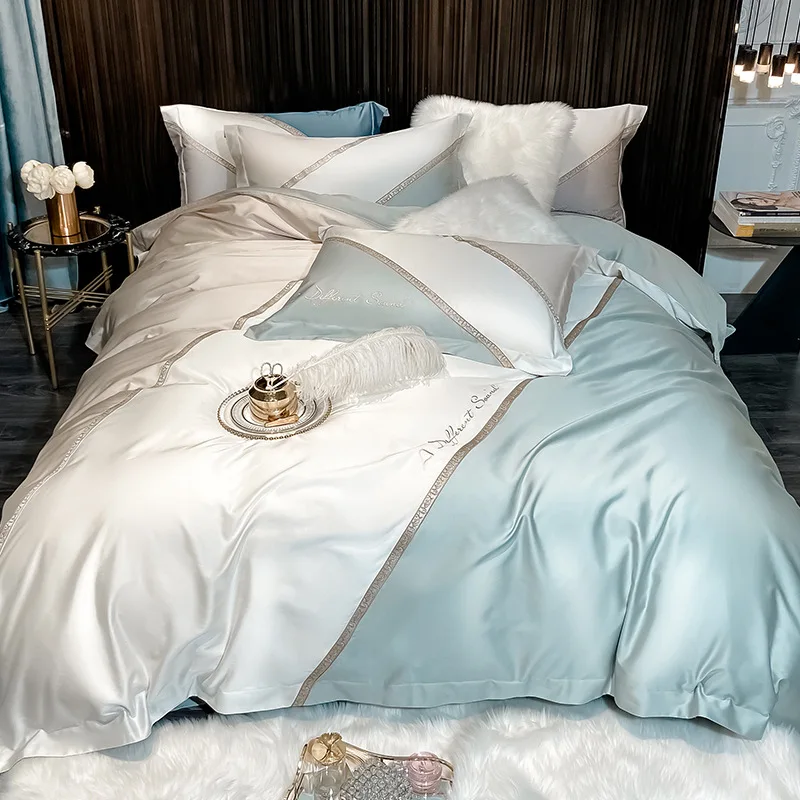 Light luxury 80 pcs Austrian Lenzing Tencel cotton four-piece set ice silk color matching quilt cover sleeping naked and silky