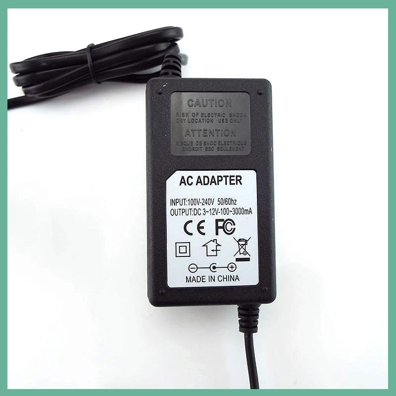 AC100-240V to DC 3-12V Multi Voltage Adjustable Power Supply with 8 Tips Plug Connector  Universal Adapter Switching Charger E3