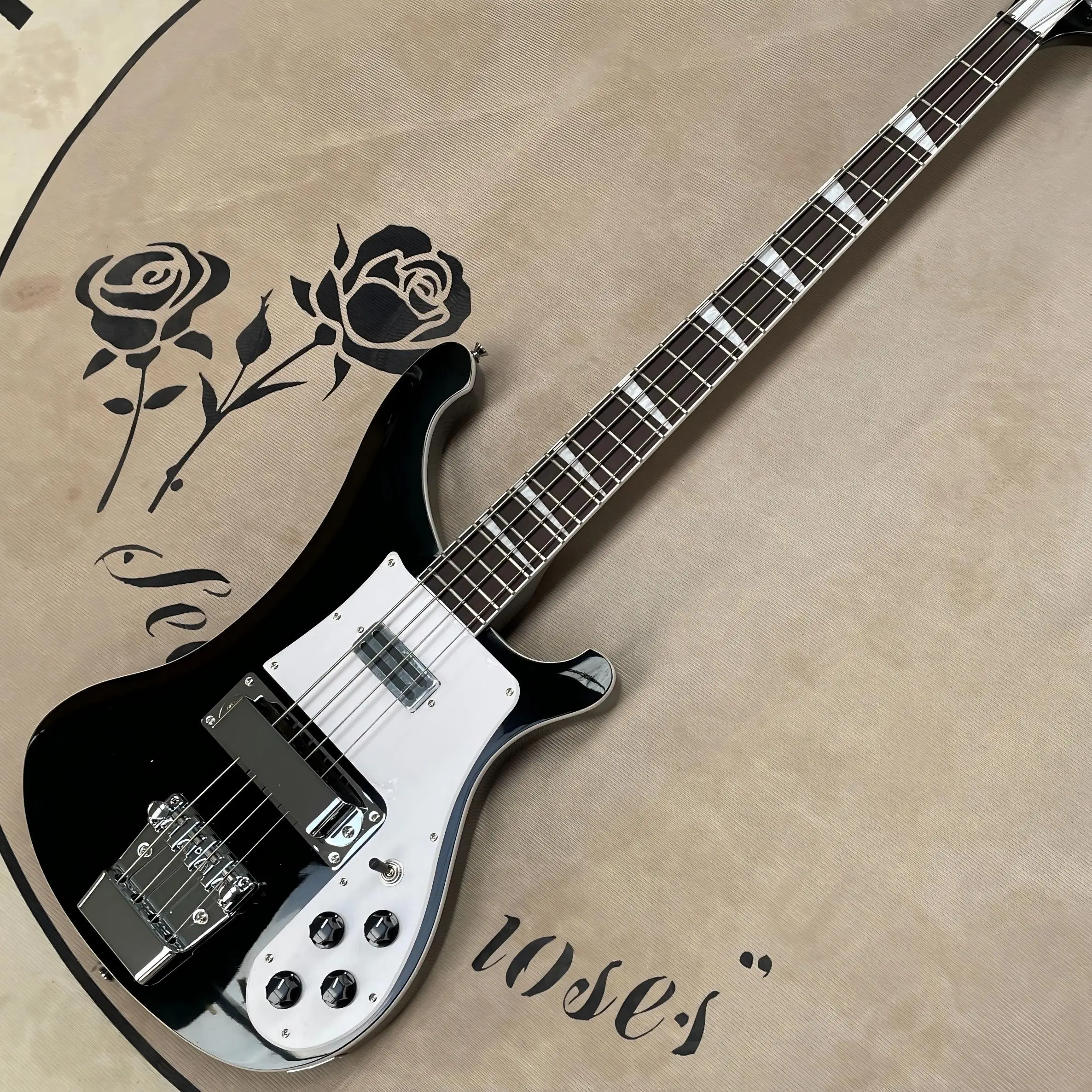 Electric Guitar, Gloss Black, Dual Single Coils, Chrome Floating Bridge, Trapezoid Pearl Inlays, Rock Punk