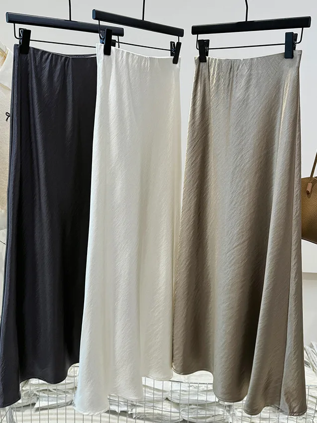 

Elegant Coffee Brown Fish Tail Half Skirt Simple Stylish mid Waist A-Line Skirt for Casual Wear Standard Fit Summer New Arrival