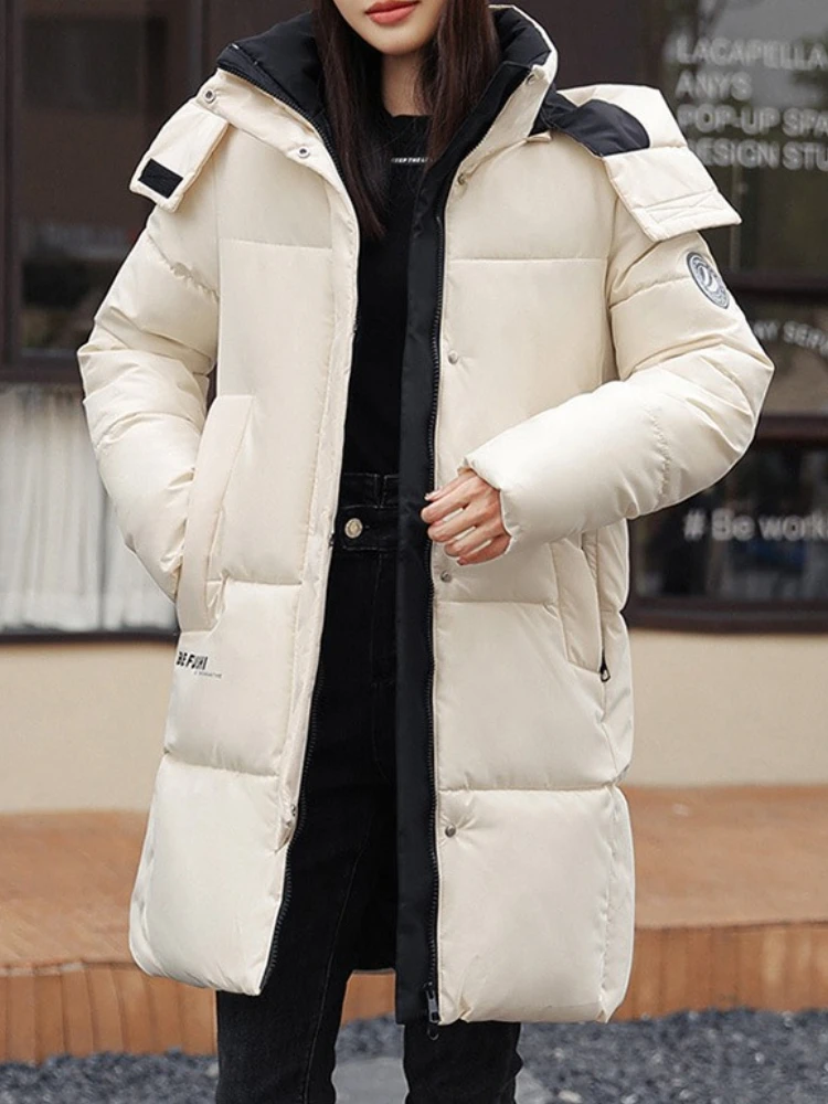 Neu in der Winter-Daunen-Baumwolljacke für Damen, warme, verdickte, mit Baumwolle gefütterte Jacke, koreanische, lockere Parkas in Übergröße, langer Mantel