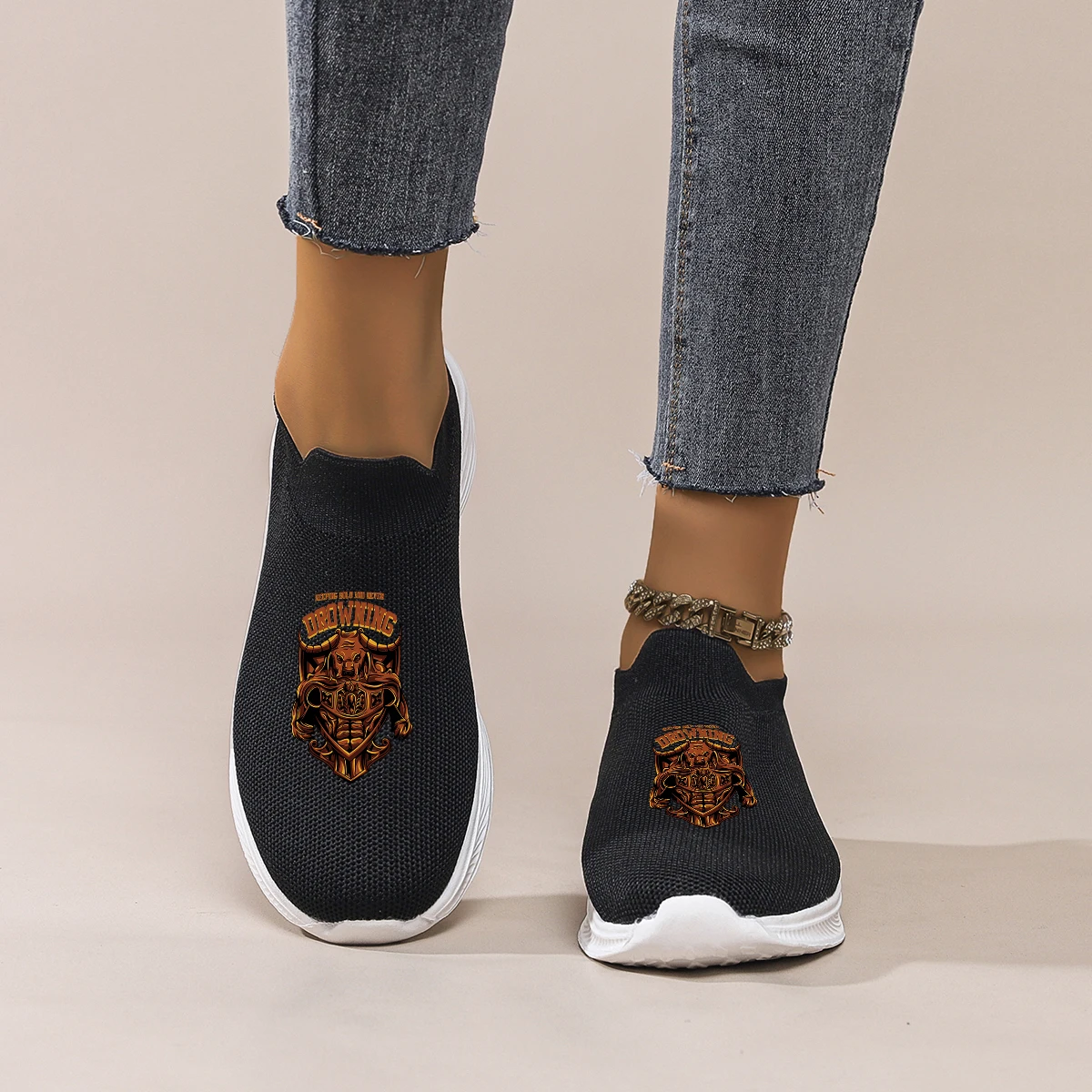

Women's Black Mesh Slip-On Sneakers: Trendy Graphic Print, Lightweight & Comfortable for Daily Wear. Pair with Jeans & Joggers