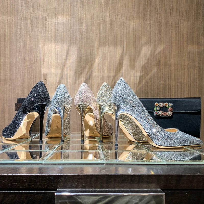 Luksusowe buty damskie 2024 nowe kopciuszek damskie czółenka błyszczące Rhinestone wysokie obcasy szpiczasty nosek skórzane kryształowe buty na