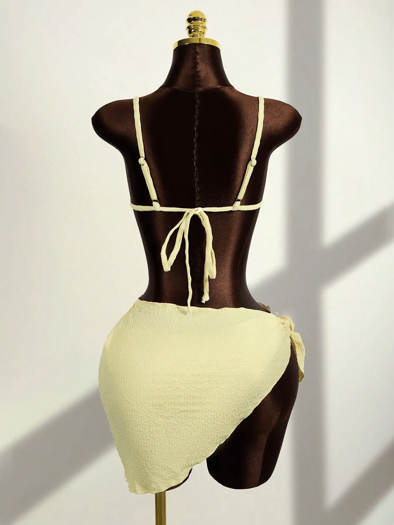 

Cream Yellow Textured Floral Bikini Set With Tie Back And Sarong For Beach Vacation