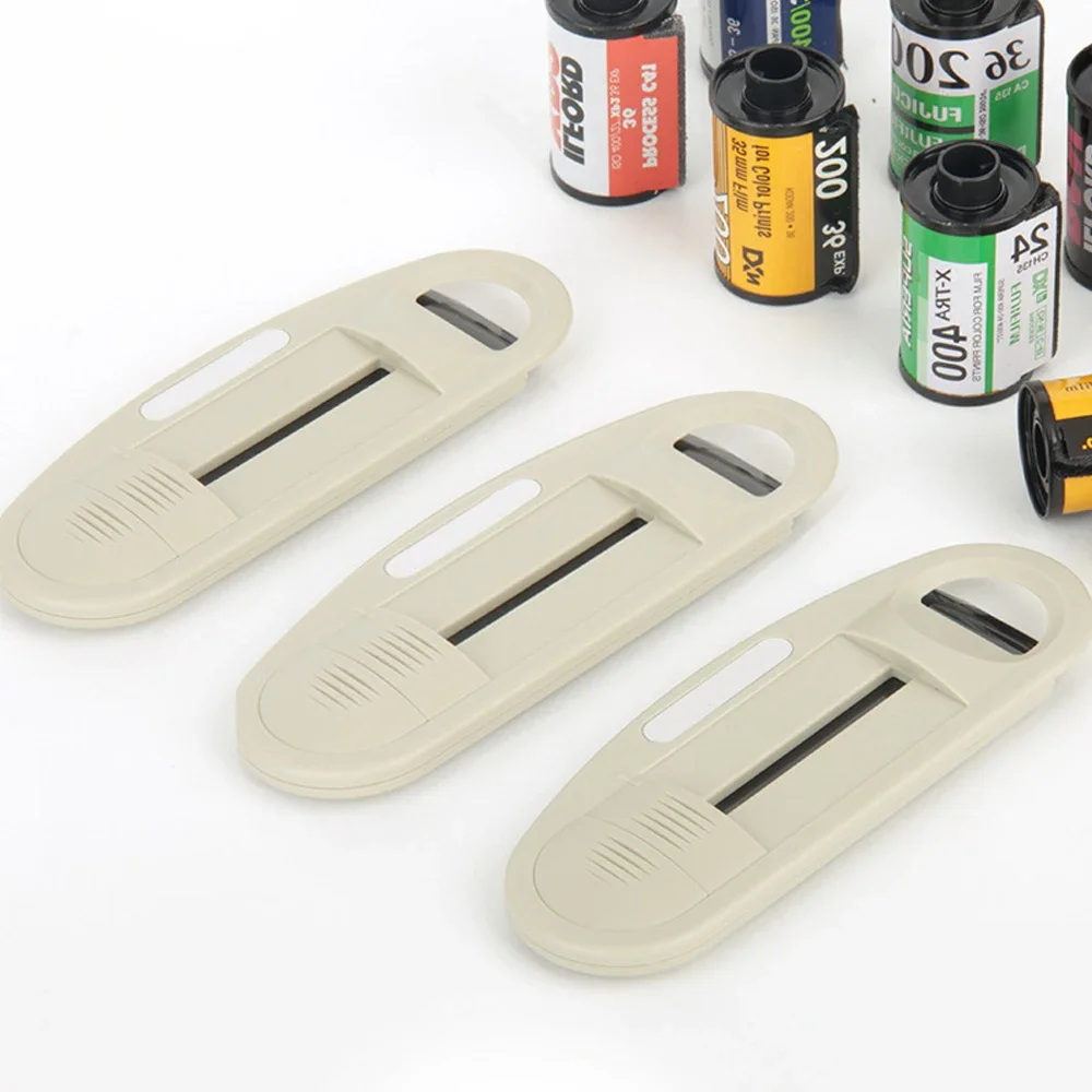 

Инструмент для извлечения пленки 35 мм (135 мм) с трехслойным лидером, без темной комнаты