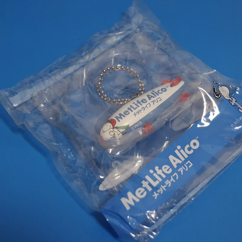 Figura Snoppy, muñeco de perro blanco, modelo de avión, bolso, llavero colgante, juguete de colección para niños