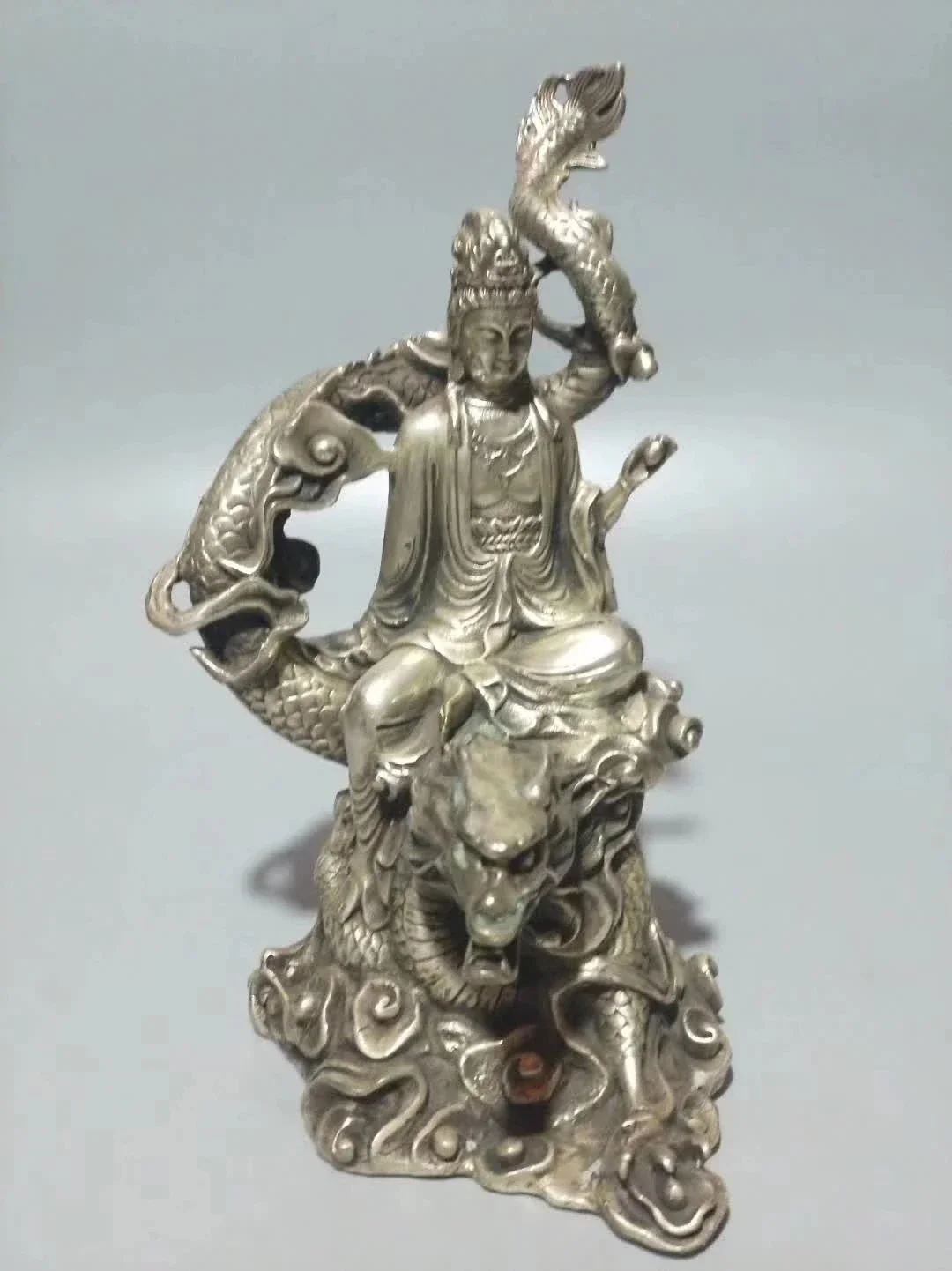 

Collection Tibet Silver Handmade Carved Guanyin Kwan-yin Bodhisattva Riding Dragon Buddha Statue Home Decoration