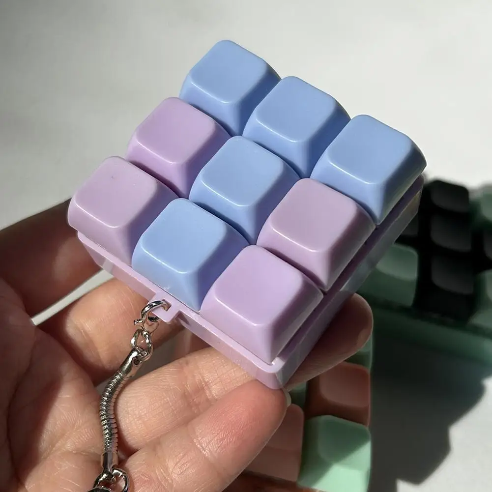 ‌ تململ المفاتيح لعبة 9 مفاتيح لوحة المفاتيح زر الإجهاد الإغاثة قلادة مكافحة القلق فنجر الصحافة قبعات للبالغين والأطفال